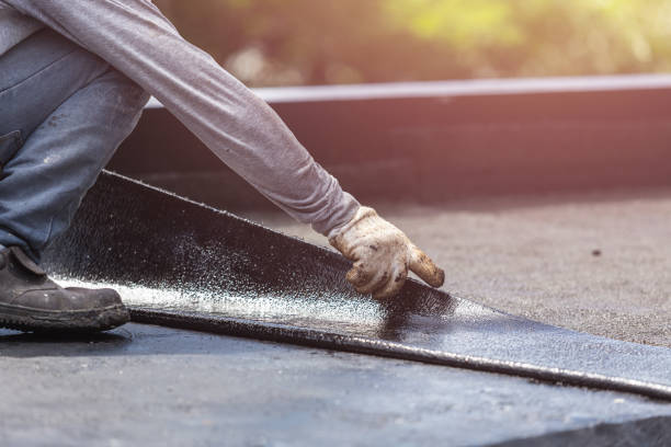 Professional Basement Waterproofing technician working in Huntsville, TN